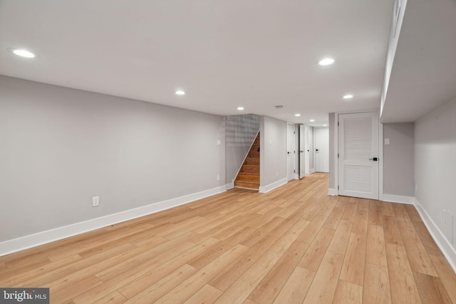 basement featuring light wood-type flooring