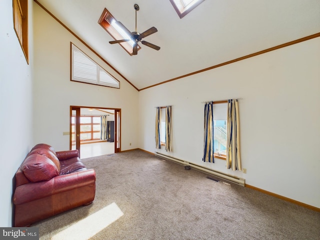 carpeted living room featuring a skylight, high vaulted ceiling, ceiling fan, and baseboard heating