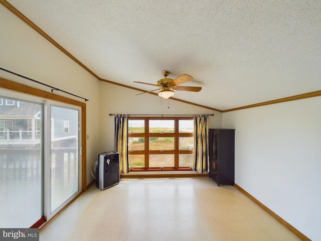 unfurnished room featuring ceiling fan, ornamental molding, and a textured ceiling