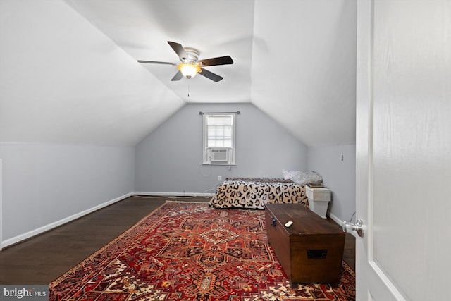 sitting room featuring ceiling fan, cooling unit, dark hardwood / wood-style floors, and vaulted ceiling