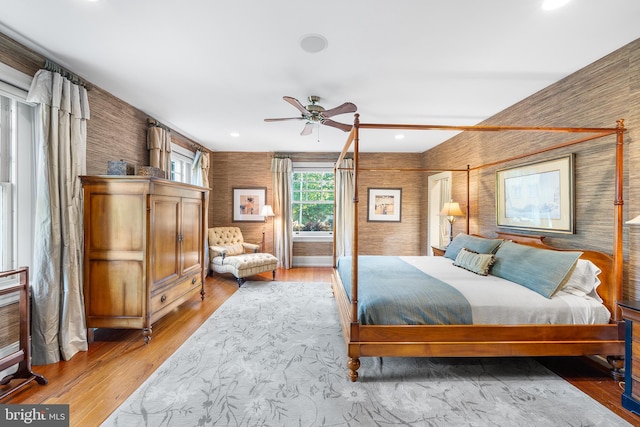 bedroom with hardwood / wood-style flooring and ceiling fan