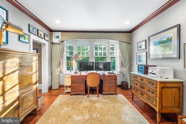 home office featuring crown molding and hardwood / wood-style floors