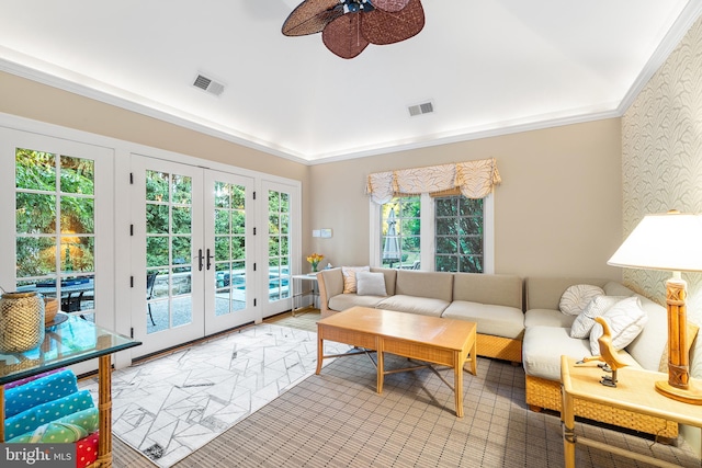 living room featuring french doors, ceiling fan, and ornamental molding