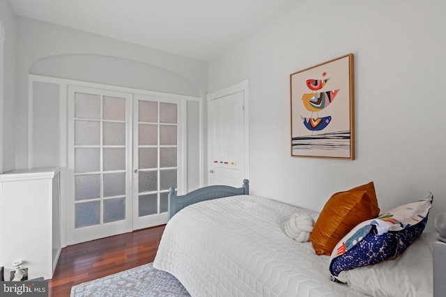 bedroom featuring dark hardwood / wood-style floors