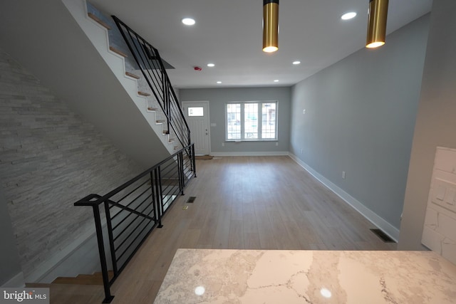 interior space with light hardwood / wood-style flooring