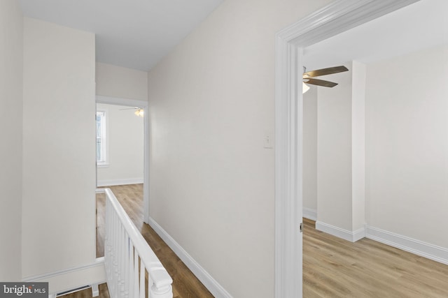 hallway featuring light hardwood / wood-style flooring