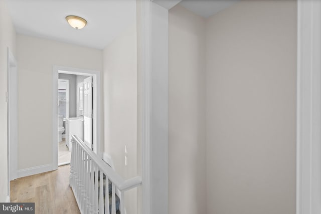 corridor featuring light hardwood / wood-style flooring