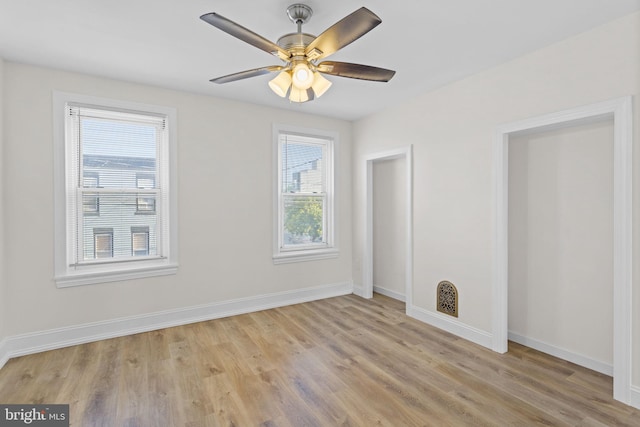 unfurnished room featuring ceiling fan and light hardwood / wood-style floors