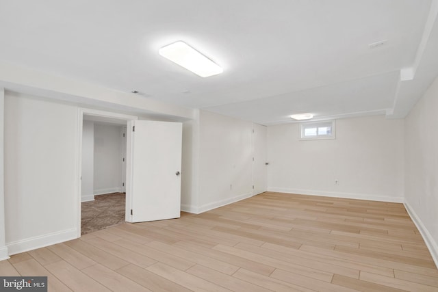 basement with light wood-type flooring