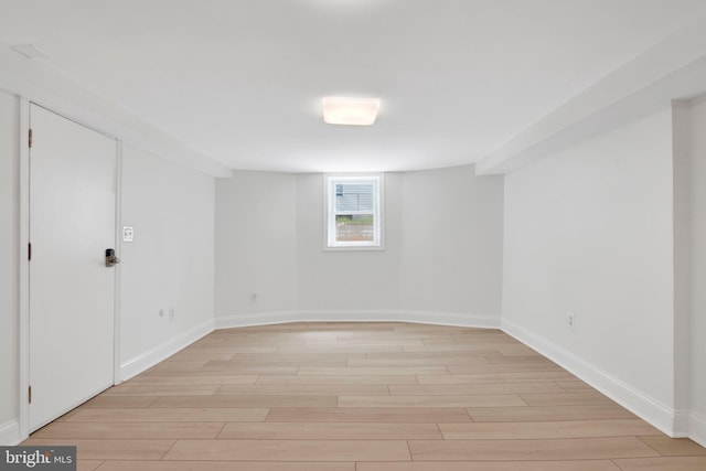 basement featuring light hardwood / wood-style floors