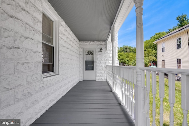 balcony featuring a porch