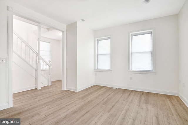 empty room with light wood-type flooring