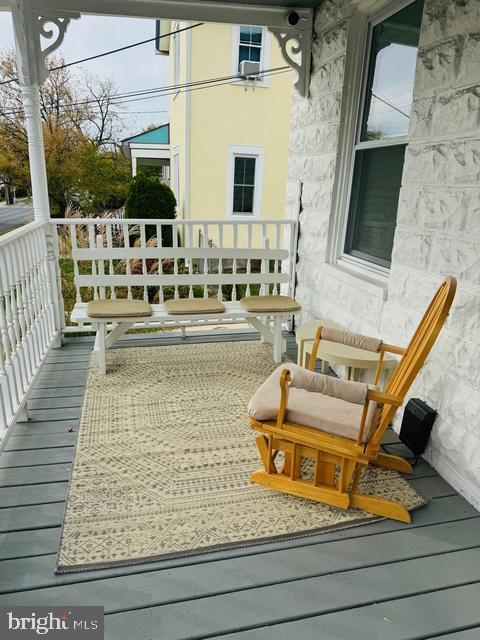 wooden deck with a porch