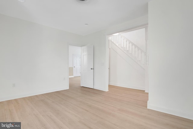 unfurnished room featuring light hardwood / wood-style flooring