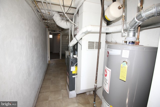 utility room with water heater