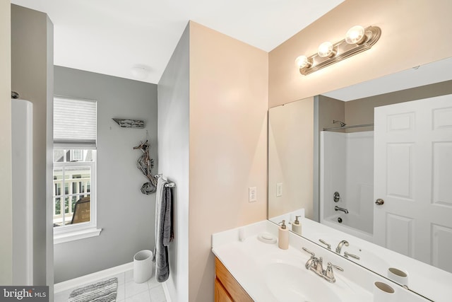 bathroom with tile patterned floors, bathing tub / shower combination, and vanity