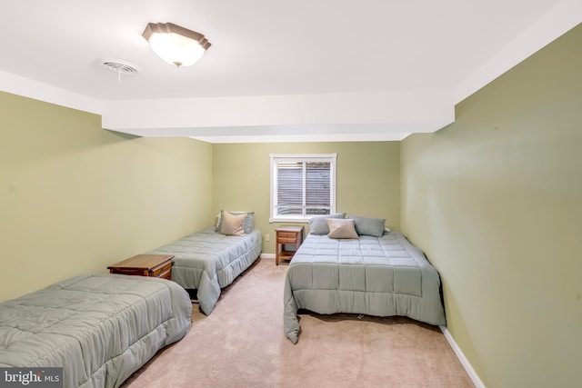 bedroom with light carpet