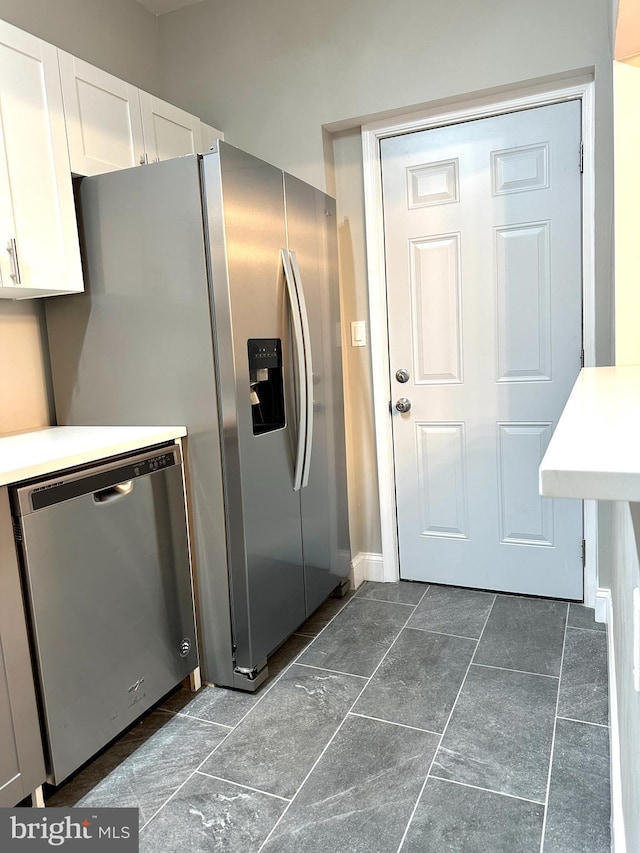 kitchen featuring white cabinets and stainless steel appliances