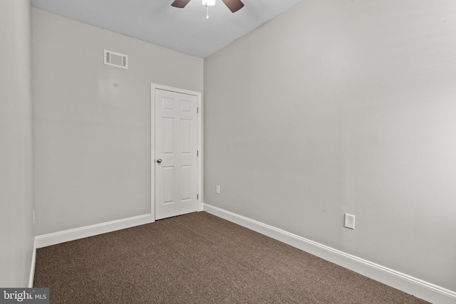 carpeted empty room with ceiling fan