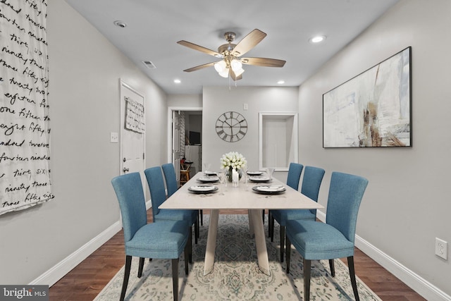 dining space featuring hardwood / wood-style floors and ceiling fan