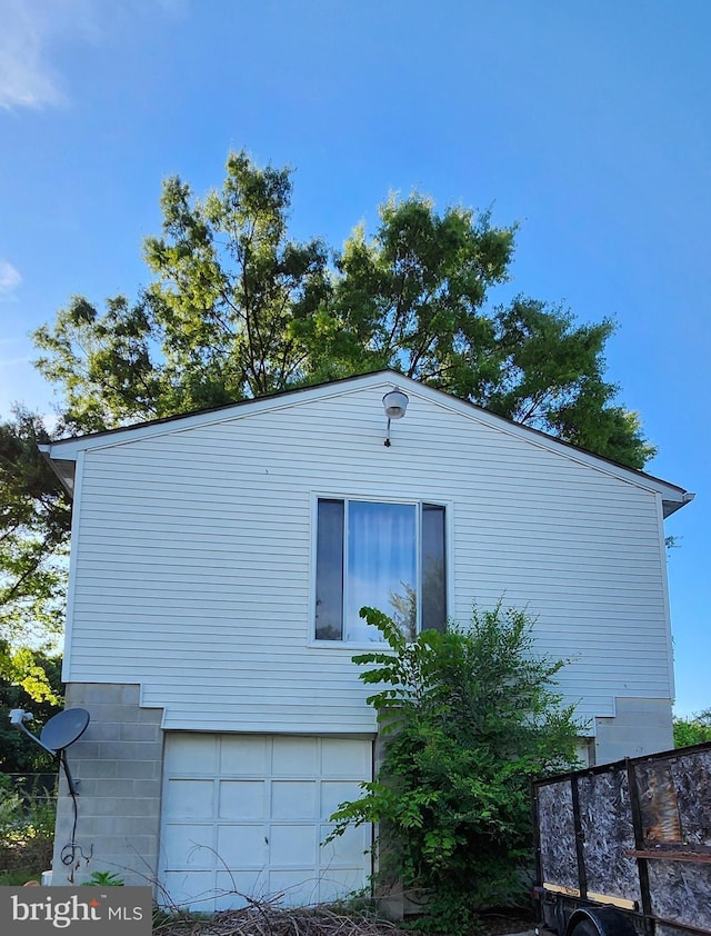 view of home's exterior featuring a garage