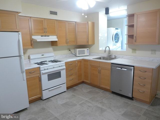 kitchen with ceiling fan, white appliances, and sink