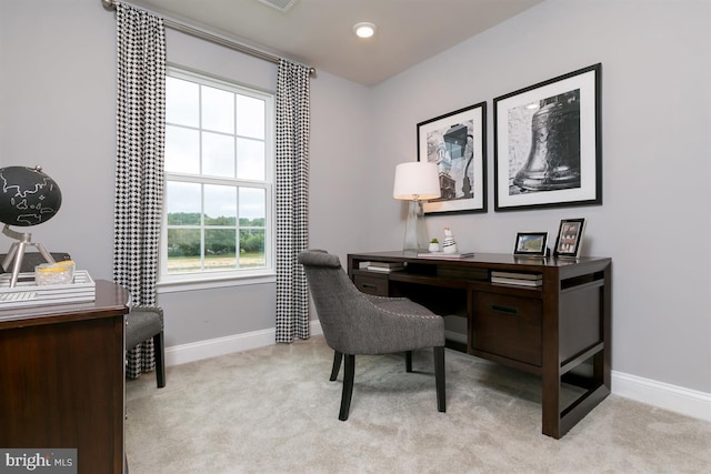 carpeted home office featuring plenty of natural light