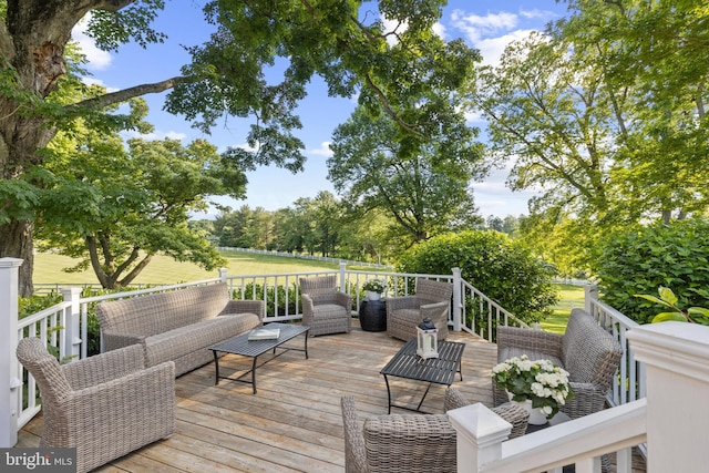 deck with an outdoor hangout area