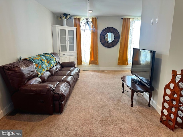 living room featuring light colored carpet