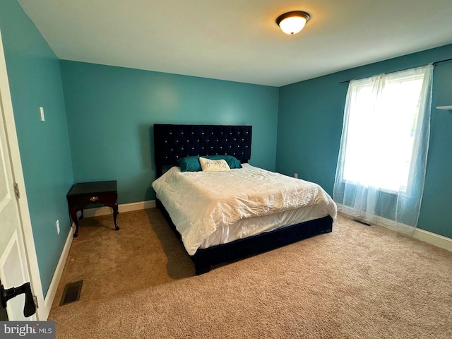 bedroom featuring carpet floors