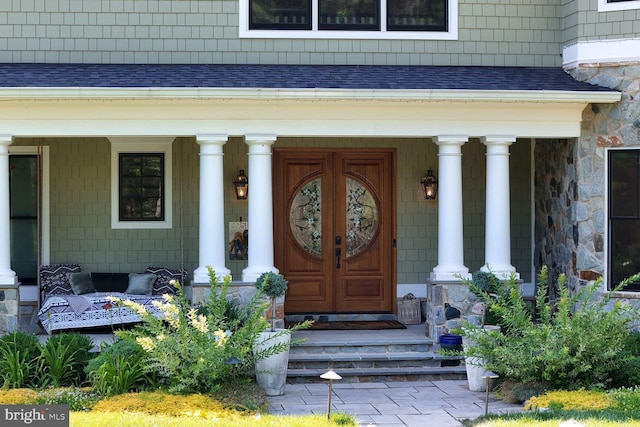 property entrance with covered porch