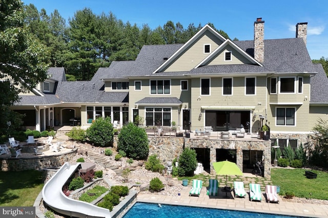 rear view of house with a patio area