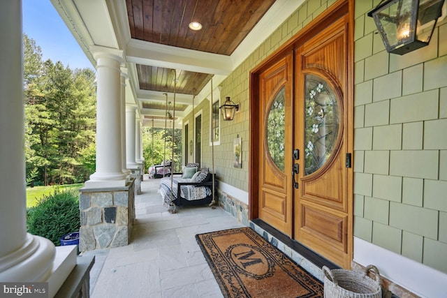 entrance to property with covered porch