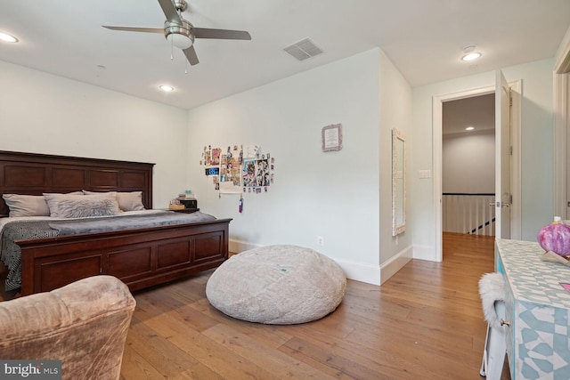 bedroom featuring light wood-type flooring and ceiling fan