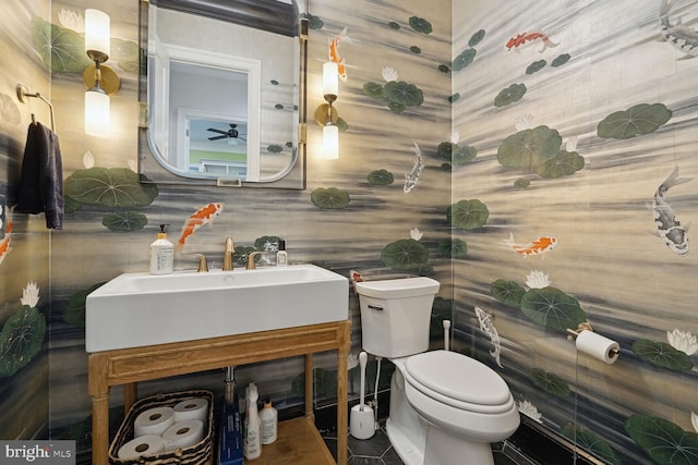 bathroom with vanity, ceiling fan, and toilet