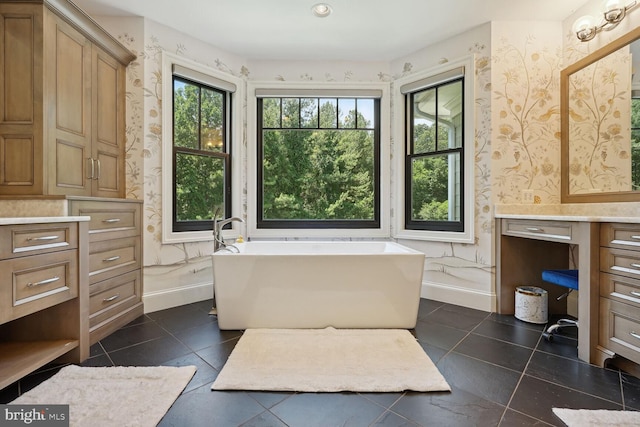 bathroom with a tub