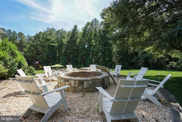 view of patio featuring a fire pit