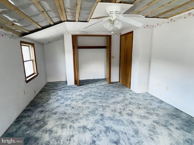 interior space featuring ceiling fan