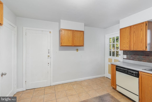 kitchen with dishwasher, decorative backsplash, and light tile patterned floors