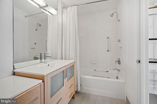 bathroom with vanity, tile patterned flooring, and shower / tub combo