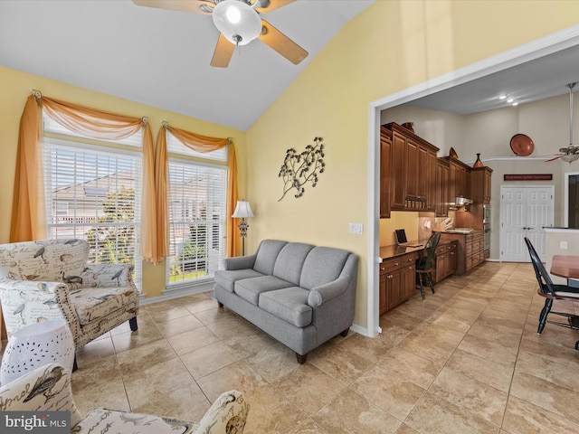 living room with ceiling fan, light tile patterned flooring, and high vaulted ceiling