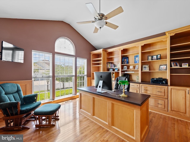 office area featuring ceiling fan, light wood-type flooring, and lofted ceiling