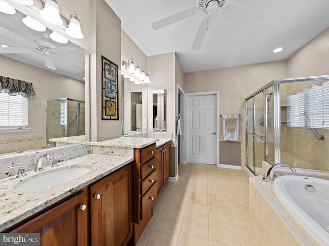 bathroom featuring plus walk in shower, tile patterned floors, vanity, and ceiling fan