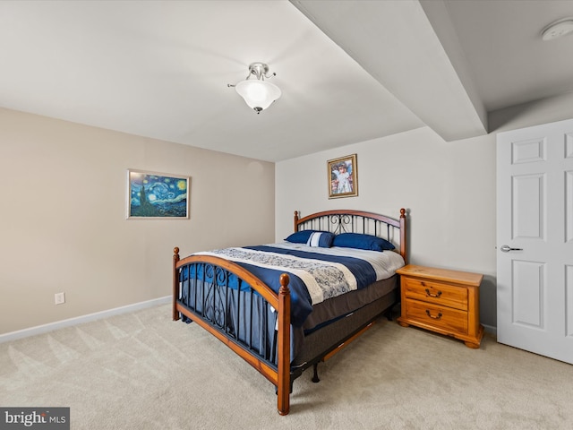 bedroom with light carpet