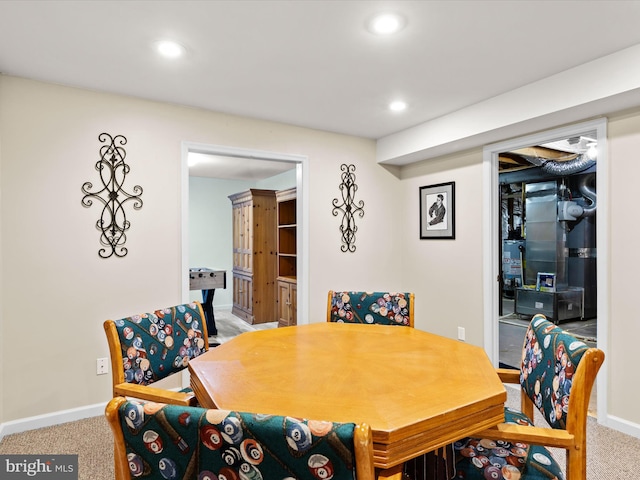 dining space featuring carpet floors