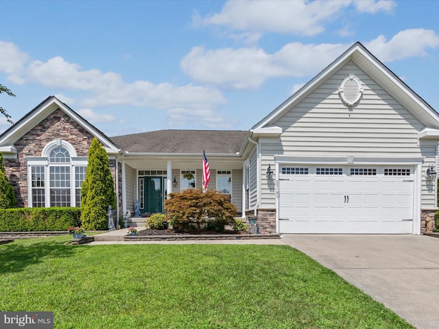 front of property with a garage and a front yard