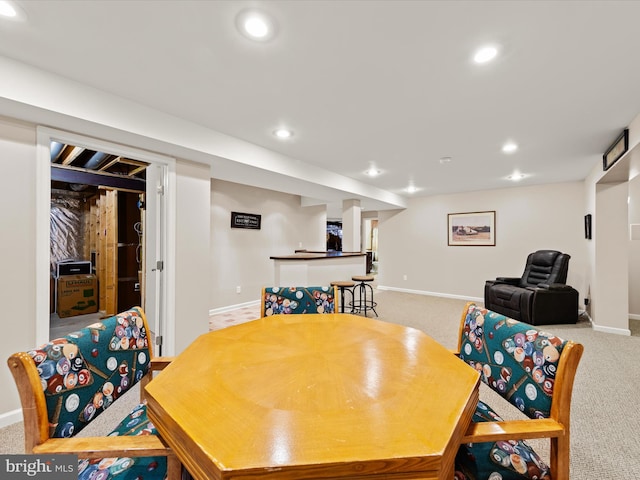 view of carpeted dining space