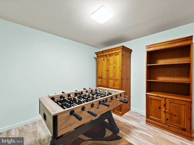 recreation room featuring light wood-type flooring