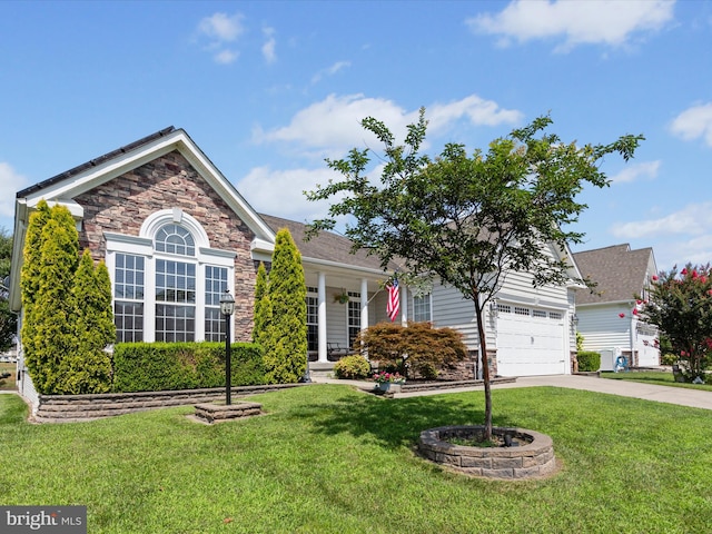 view of front of property with a front lawn and a garage