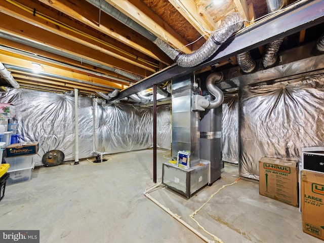 basement featuring heating unit